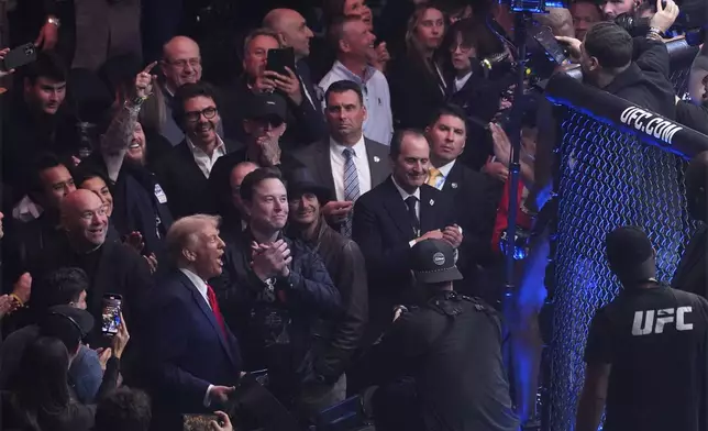 President-elect Donald Trump greets Jon Jones after he defeated Stipe Miocic at UFC 309 at Madison Square Garden, early Sunday, Nov. 17, 2024, in New York. (AP Photo/Evan Vucci)