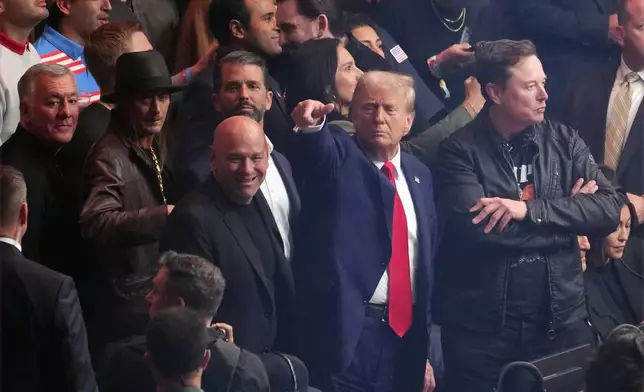 President-elect Donald Trump attends UFC 309 at Madison Square Garden, Saturday, Nov. 16, 2024, in New York, with Kid Rock, Donald Trump Jr., Dana White and Elon Musk. (AP Photo/Evan Vucci)