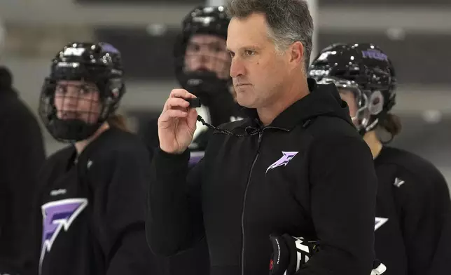 Minnesota Frost head coach Ken Klee watches over his players during a PWHL hockey practice Thursday, Nov. 14, 2024 at TRIA Rink in St. Paul, Minn. (Anthony Souffle/Star Tribune via AP)