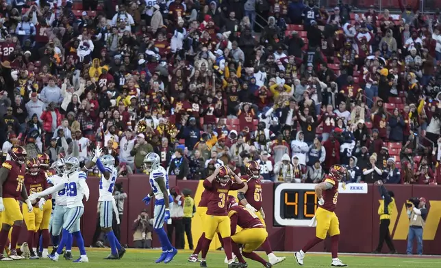 Washington Commanders place kicker Austin Seibert (3) reacts after an unsuccessful point after attempt during the second half of an NFL football game against the Dallas Cowboys, Sunday, Nov. 24, 2024, in Landover, Md. (AP Photo/Stephanie Scarbrough)