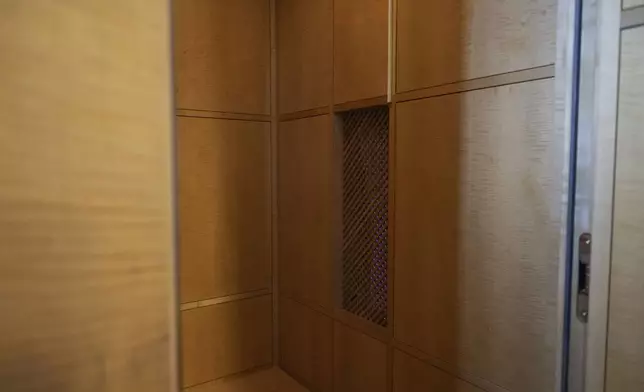 An experimental art installation with an AI Jesus entitled, Deus in Machina, installed in a confessional in St. Peter's Chapel in the old town of Lucerne, Switzerland, Sunday, Aug. 25, 2024. (Urs Flueeler/Keystone via AP)