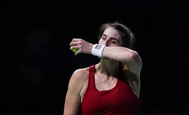 Canada's Rebecca Marino reacts during her match against Emma Raducanu of Britain during the Billie Jean King Cup Finals, at the Martin Carpena Sports Hall, in Malaga, southern Spain, on Sunday, Nov. 17, 2024. (AP Photo/Manu Fernandez)
