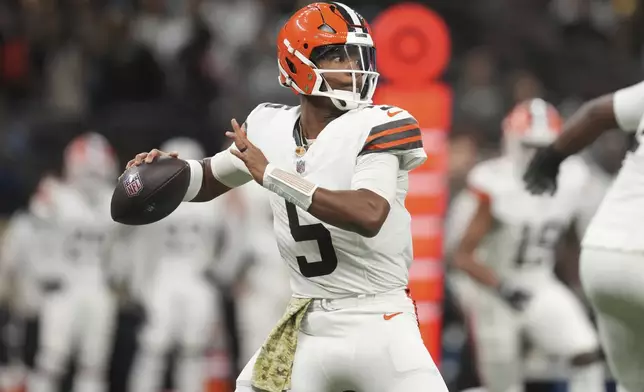 Cleveland Browns quarterback Jameis Winston (5) passes in the first half of an NFL football game against the New Orleans Saints in New Orleans, Sunday, Nov. 17, 2024. (AP Photo/Gerald Herbert)