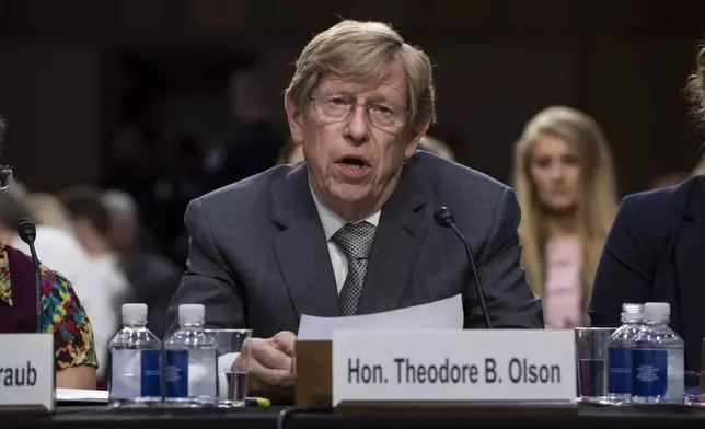 FILE - Former Solicitor General Ted Olson testifies on a panel of experts and character witnesses before the Senate Judiciary Committee on behalf of President Donald Trump's Supreme Court nominee Brett Kavanaugh on the final day of the confirmation hearings, on Capitol Hill in Washington, Sept. 7, 2018. (AP Photo/J. Scott Applewhite, File)