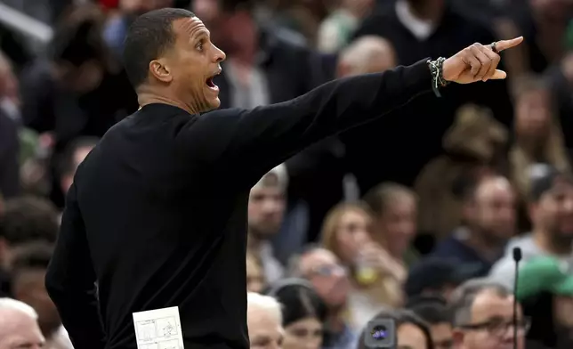 Boston Celtics head coach Joe Mazzulla yells from the sideline during the first half of an NBA basketball game against the Toronto Raptors, Saturday, Nov. 16, 2024, in Boston. (AP Photo/Mark Stockwell)