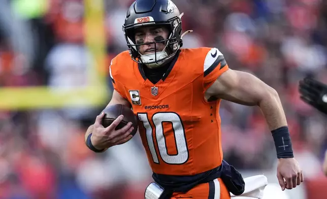 Denver Broncos quarterback Bo Nix (10) runs out of the pocket against the Atlanta Falcons during the second half of an NFL football game, Sunday, Nov. 17, 2024, in Denver. (AP Photo/Jack Dempsey)