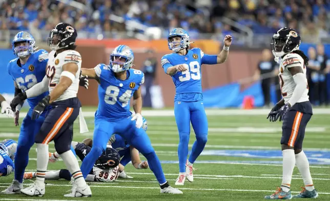 Detroit Lions place-kicker Jake Bates (39) kicks a 36-yard field goal against the Chicago Bears during the first half of an NFL football game, Sunday, Nov. 17, 2024, in Detroit. (AP Photo/Carlos Osorio)