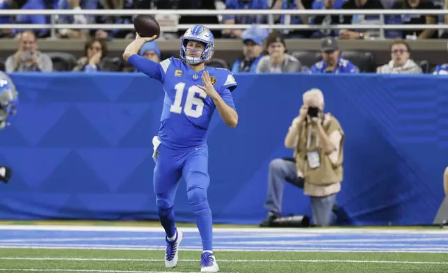 CORRECTS BYLINE Detroit Lions quarterback Jared Goff (16) throws against the Chicago Bears during the first half of an NFL football game, Sunday, Nov. 17, 2024, in Detroit. (AP Photo/Duane Burleson)