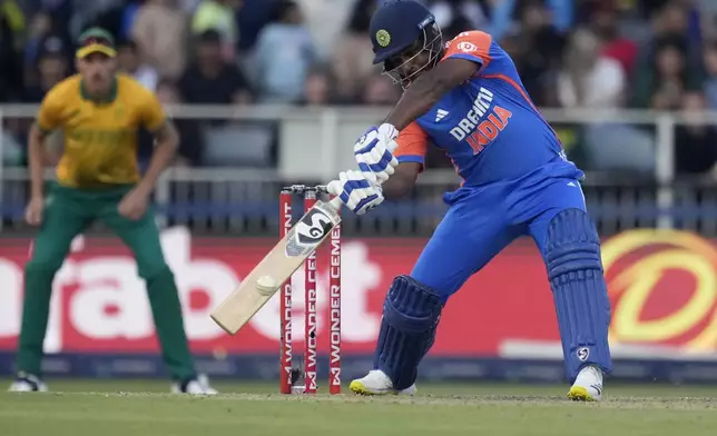 India's Sanju Samson plays a shot during the fourth T20 cricket match between South Africa and India at the Wanderers Stadium in Johannesburg, South Africa, Friday, Nov. 15, 2024. (AP Photo/Themba Hadebe)