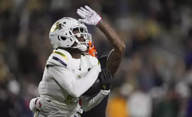 Georgia Tech wide receiver Eric Singleton Jr. (2) misses a pass during the first half of an NCAA college football game against North Carolina State, Thursday, Nov. 21, 2024, in Atlanta. (AP Photo/Brynn Anderson)