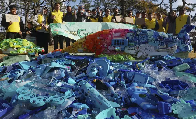 Environment activists stage a rally calling for a strong global plastics treaty ahead of the fifth session of the Intergovernmental Negotiating Committee on Plastic Pollution which sets to be held from Nov. 25 to Dec. 1 in Busan, South Korea, Saturday, Nov. 23, 2024. (Son Hyung-joo/Yonhap via AP)