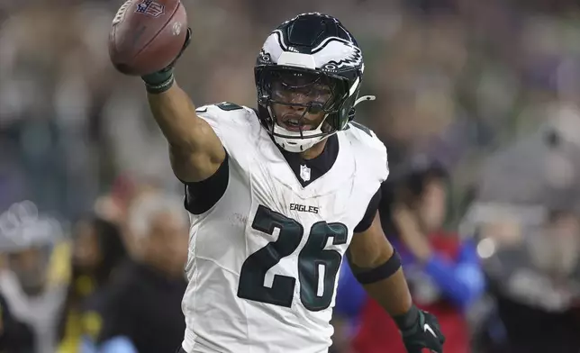 Philadelphia Eagles running back Saquon Barkley (26) reacts after a run against the Los Angeles Rams during the second half of an NFL football game in Inglewood, Calif., Sunday, Nov. 24, 2024. (AP Photo/Ryan Sun)