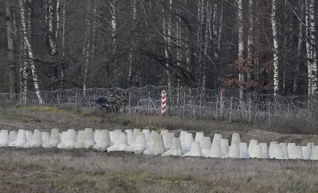 A Polish soldier at Poland's border with Russia in Dabrowka, Poland, on Saturday Nov. 30, 2024. (AP Photo/Czarek Sokolowski)