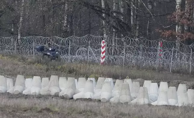 A Polish soldier at Poland's border with Russia in Dabrowka, Poland, on Saturday Nov. 30, 2024. (AP Photo/Czarek Sokolowski)