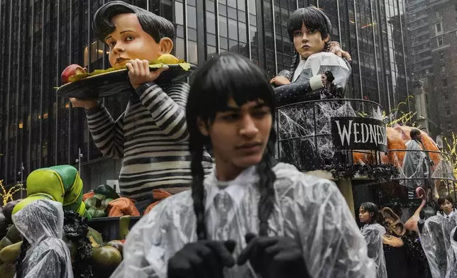 The Wednesday's Feast float moves down Sixth Avenue during the Macy's Thanksgiving Day Parade, Thursday, Nov. 28, 2024, in New York. (AP Photo/Julia Demaree Nikhinson)