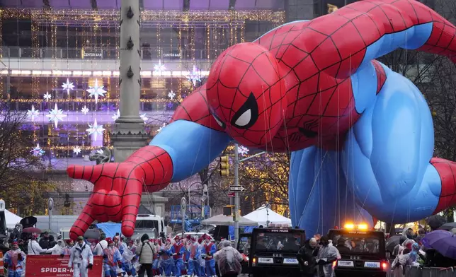 The Spider-Man balloon floats in the Macy's Thanksgiving Day Parade, Thursday, Nov. 28, 2024, in New York. (Photo by Charles Sykes/Invision/AP)