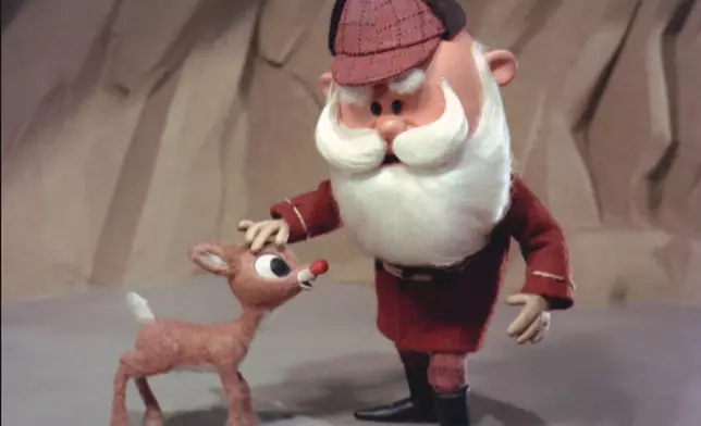 This image released by NBCUniversal shows a scene from the 1964 stop motion classic “Rudolph the Red-Nosed Reindeer.” (NBCUniversal via AP)