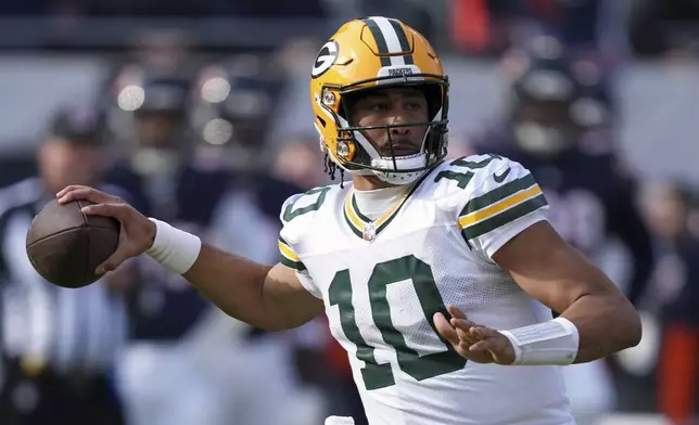 Green Bay Packers' Jordan Love throws during the first half of an NFL football game against the Chicago Bears Sunday, Nov. 17, 2024, in Chicago. (AP Photo/Charles Rex Arbogast)