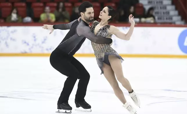 Maxime Deschamps and Deanna Stellato-Dudek of Canada during the pairs short program at the international figure skating competition Finlandia Trophy in Helsinki, Friday, Nov. 15, 2024. (Mikko Stig/Lehtikuva via AP)