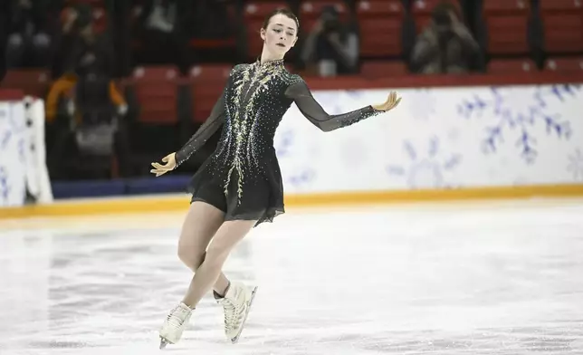 Sarah Everhardt of the United States competes in the women's short program at the Finlandia Trophy Grand Prix figure skating competition in Helsinki, Finland, Friday, Nov. 15, 2024. (Mikko Stig/Lehtikuva via AP)