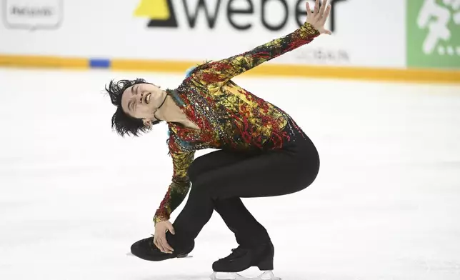 Kazuki Tomono of Japan skates during Men's, Short Program, at the international figure skating competition Grand Prix Finlandia Trophy in Helsinki, Finland on Friday, Nov. 15, 2024. (Mikko Stig /Lehtikuva via AP)