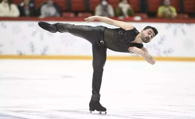 Kevin Aymoz of France skates during Men's, Short Program, at the international figure skating competition Grand Prix Finlandia Trophy in Helsinki, Finland on Friday, Nov. 15, 2024. (Mikko Stig /Lehtikuva via AP)