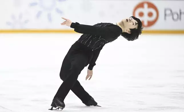 Yuma Kagiyama of Japan skates during Men's, Short Program, at the international figure skating competition Grand Prix Finlandia Trophy in Helsinki, Finland on Friday, Nov. 15, 2024. (Mikko Stig /Lehtikuva via AP)