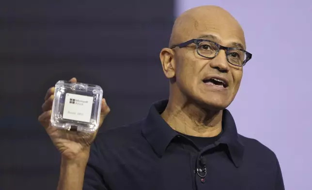 Microsoft CEO Satya Nadella introduces the Azure Boost DPU at the company's Ignite conference Tuesday, Nov. 19, 2024, in Chicago. (AP Photo/Charles Rex Arbogast)