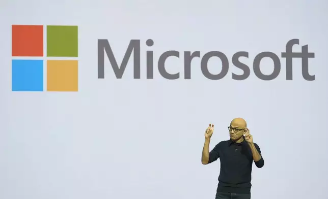 Microsoft CEO Satya Nadella addresses attendees at the Microsoft Ignite conference Tuesday, Nov. 19, 2024, in Chicago. (AP Photo/Charles Rex Arbogast)