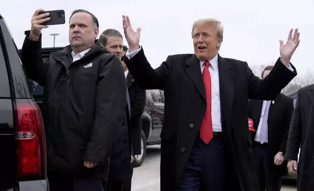 FILE - Adviser Dan Scavino takes photos as Republican presidential candidate, former President Donald Trump greets supporters at a campaign stop in Londonderry, N.H., Jan. 23, 2024. (AP Photo/Matt Rourke, File)