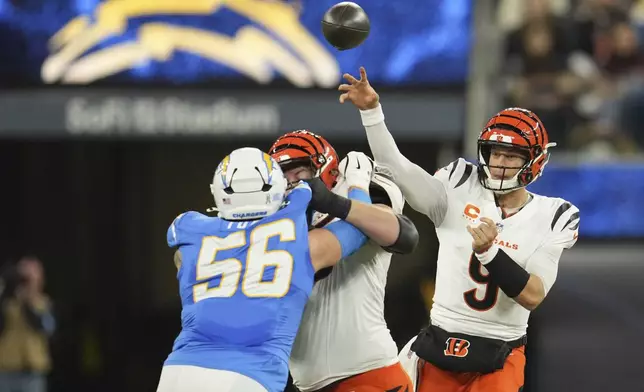 Cincinnati Bengals quarterback Joe Burrow (9) throws a pass during the first half of an NFL football game against the Los Angeles Chargers, Sunday, Nov. 17, 2024, in Inglewood, Calif. (AP Photo/Eric Thayer)