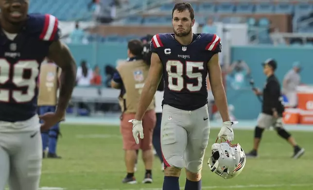 New England Patriots tight end Hunter Henry (85) leaves then field at the end of the second half of an NFL football game against the Miami Dolphins, Sunday, Nov. 24, 2024, in Miami Gardens, Fla. (AP Photo/Lynne Sladky)