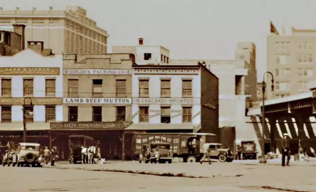 This image from the Collections of the New York Public Library shows part of New York's Meatpacking District, and the construction of the High Line Railway, right. (Collections of the New York Public Library via AP)