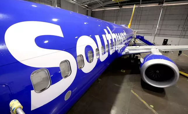 FILE - A retrofitted Southwest Airlines passenger jet is shown in a hangar at Love Field on Sept. 26, 2024, in Dallas. (AP Photo/Tony Gutierrez, File)