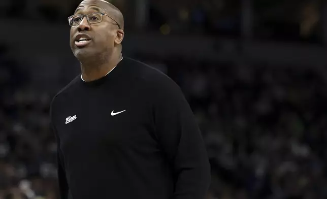 Sacramento Kings head coach Mike Brown paces the sideline during the first half of an NBA basketball game against the Minnesota Timberwolves, Wednesday, Nov. 27, 2024, in Minneapolis. (AP Photo/Ellen Schmidt)