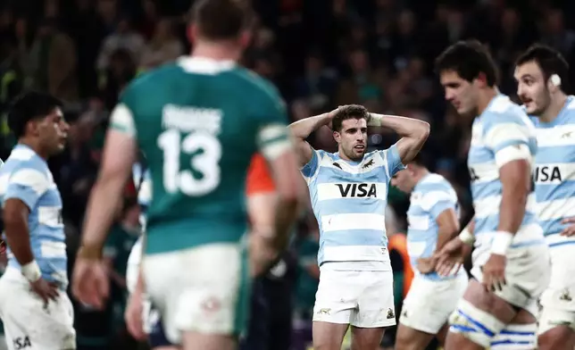 Argentina's players dejected at the end of the Autumn Nations series rugby union match between Ireland and Argentina, at Aviva Stadium, Dublin, Ireland, Saturday, Nov. 16, 2024. (AP Photo/Peter Morrison)