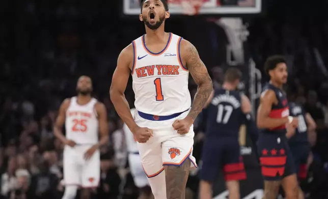 New York Knicks' Cameron Payne reacts during the first half of an NBA basketball game against the Washington Wizards, Monday, Nov. 18, 2024, in New York. (AP Photo/Seth Wenig)