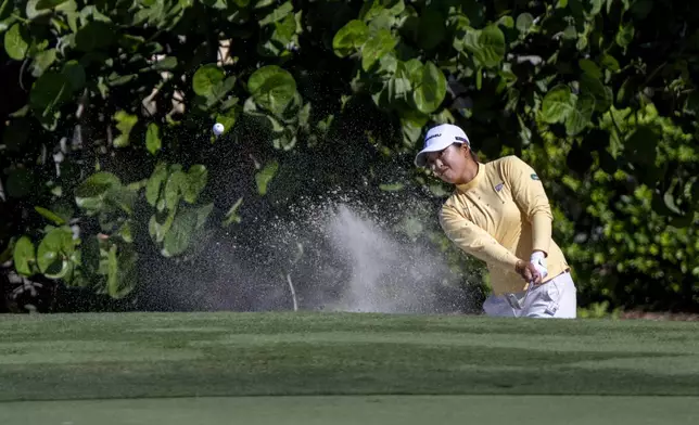 Mao Saigo hits from the sand on the sixth hole during the first round of the LPGA CME Group Tour Championship golf tournament Thursday, Nov. 21, 2024, in Naples, Fla. (AP Photo/Chris Tilley)