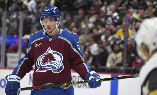 Colorado Avalanche left wing Artturi Lehkonen waits for a face off in the first period of an NHL hockey game against the Vegas Golden Knights Wednesday, Nov. 27, 2024, in Denver. (AP Photo/David Zalubowski)