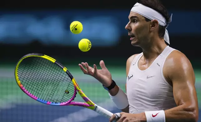 Spain's tennis player Rafael Nadal attends a training session in Malaga, southern Spain, on Monday, Nov. 18, 2024. (AP Photo/Manu Fernandez)