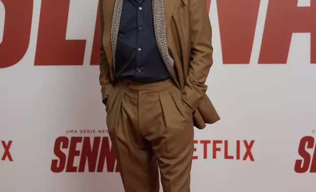 British actor Patrick Kennedy poses for photos on the red carpet for the Netflix series Senna, about the life and death of Formula 1 legend Ayrton Senna, who was killed in 1994 in a crash, in Sao Paulo, Tuesday, Nov. 26, 2024. (AP Photo/Andre Penner)