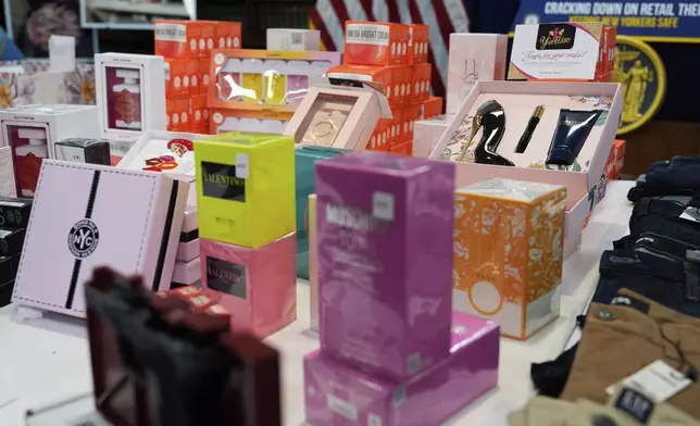 Stolen merchandise is displayed during a press conference on an international stolen merchandise ring, Tuesday, Nov. 26, 2024, in the Queens borough of New York. (AP Photo/Julia Demaree Nikhinson)