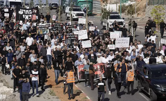 Palestinian citizens of Israel march against Israel's military operations in the Gaza Strip, in Umm al-Fahm, Israel, Friday, Nov. 15, 2024. (AP Photo/Mahmoud Illean