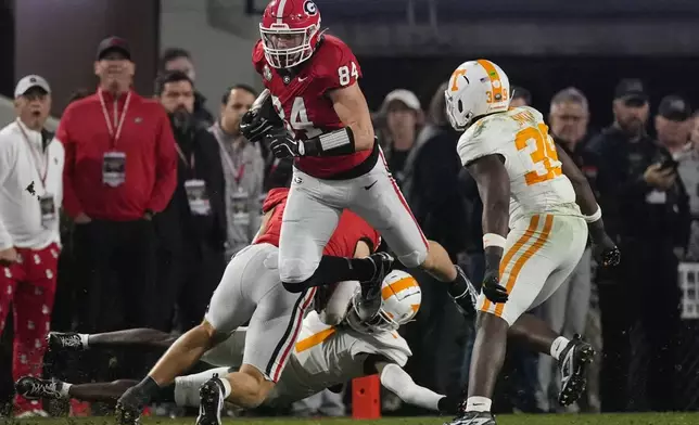 Georgia tight end Ben Yurosek (84) run s after a catch during the first half of an NCAA college football game against Tennessee, Saturday, Nov. 16, 2024, in Athens, Ga. (AP Photo/John Bazemore) Tennessee