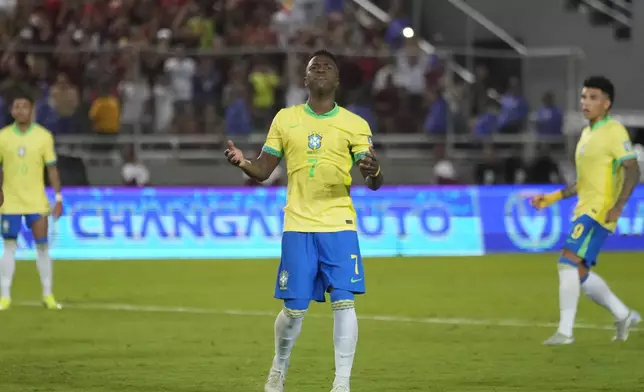Brazil's Vinicius Junior reacts after missing a penalty kick during a FIFA World Cup 2026 qualifying soccer match against Venezuela at Monumental stadium in Maturin, Venezuela, Thursday, Nov. 14, 2024. (AP Photo/Ariana Cubillos)