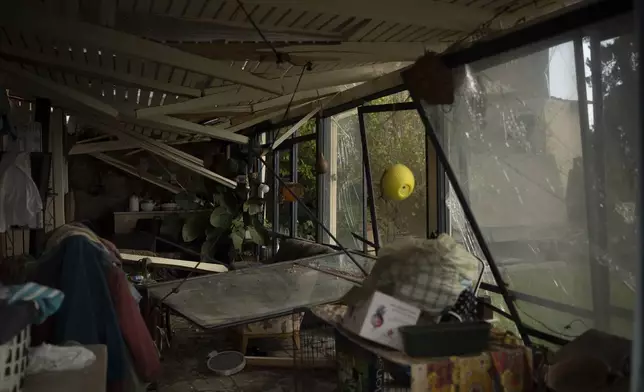 A damaged room of a house is seen in the Kibbutz Manara, which is located near to the border with Lebanon, in the northern Israel, Thursday, Nov. 28, 2024. (AP Photo/Leo Correa)