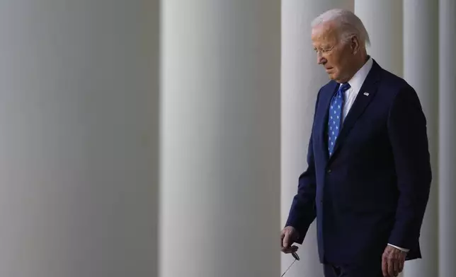 President Joe Biden walks out to speak in the Rose Garden of the White House in Washington Tuesday, Nov. 26, 2024. (AP Photo/Ben Curtis)