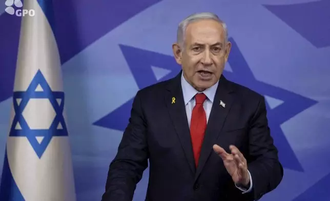 In this screen grab image from video provide by the Israeli Government Press Office, Israeli Prime Minister Benjamin Netanyahu makes a televised statement Tuesday, Nov. 26, 2024, in Jerusalem, Israel. (Israeli Government Press Office via AP)