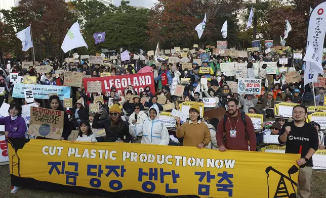 Environment activists stage a rally calling for a strong global plastics treaty ahead of the fifth session of the Intergovernmental Negotiating Committee on Plastic Pollution which sets to be held from Nov. 25 to Dec. 1 in Busan, South Korea, Saturday, Nov. 23, 2024. (Son Hyung-joo/Yonhap via AP)