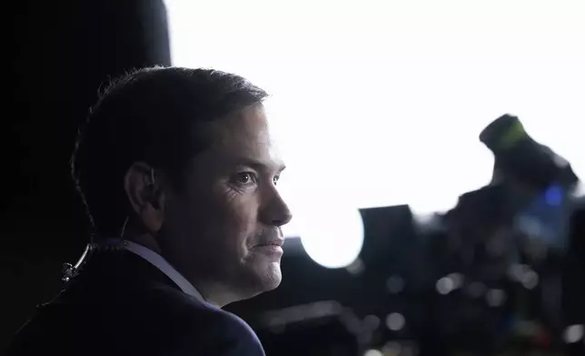 FILE - Sen. Marco Rubio, R-Fla., pauses while talking with reporters at an election night watch party in West Palm Beach, Fla., Nov. 5, 2024. (AP Photo/Alex Brandon, File)